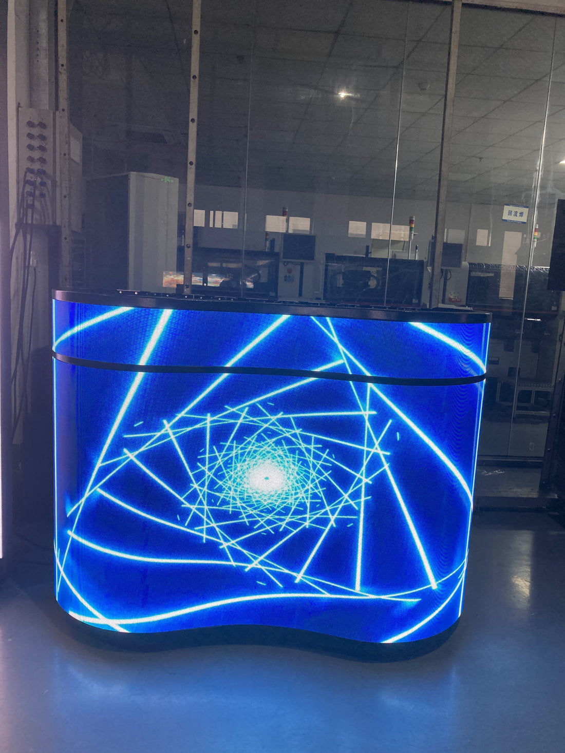 Dotcom curved LED reception display – exclusive custom-mold wave-form design for corporate lobbies, hotels, and luxury events