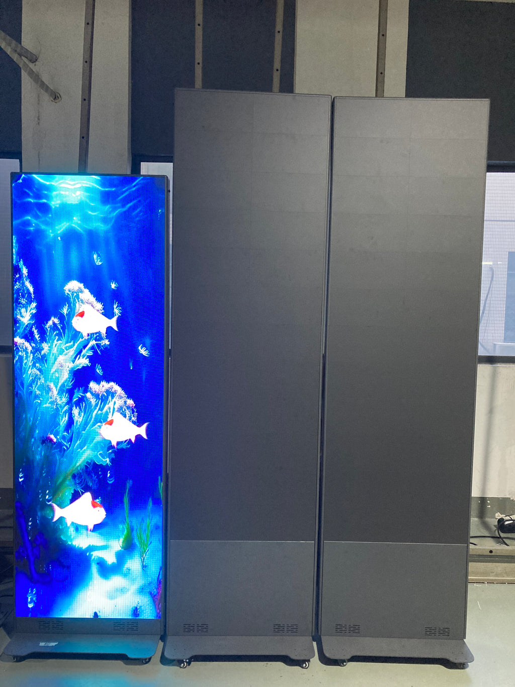 Dotcom Foldable Tall LED Poster Display P1.53–P2.5 | 640×1920mm Raised Base Portable Indoor Screen